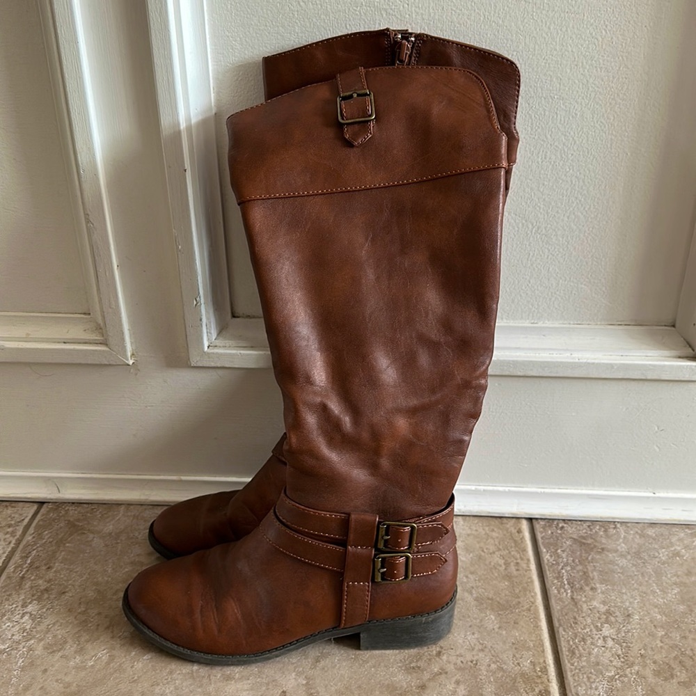 American Eagle Boots with decorative buckles on outsides. Worn but basically New